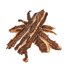 Brisket Crisps are stacked in several dried, brown pieces on a white background.